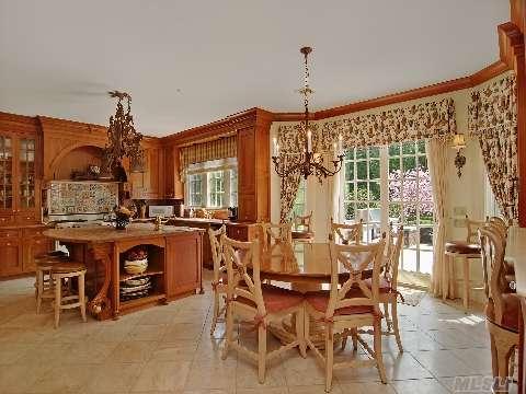 Traditional kitchen with butcher block island