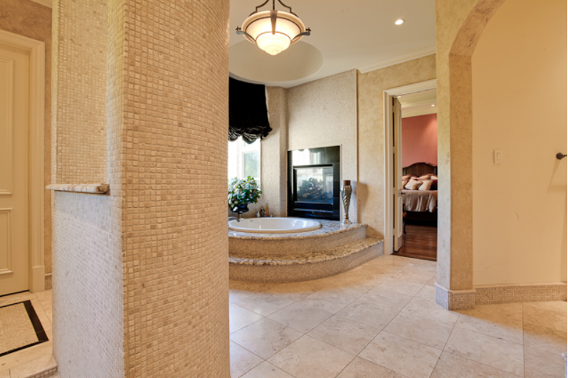 Contemporary master batroom round tub fireplace